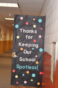 a sign that says thanks for keeping our school spotless on the wall in an hallway