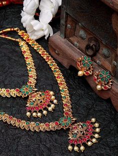 Material:- Gold Plated, Alloy Stone Type:- Pearls, Kundan These Beautiful Bridal Jewelry Set Best for gifting and personal use, You can gift your Girlfriend, Mother, Sister , Relatives , Neighbours etc. Combine it with Matching Dress and be the Limelight of every Occasion ( Diwali, Birthday, Anniversary, Christmas, Any Ritual Festival). Suitable for all Occasions. a)These are very skin Friendly. b)The plating is Non- Allergic and safe for all Environment. Gift for Her, Best Friend Gift, Gift Ideas, Valentines Day Gift,Teacher appreciation Gift, Girl Friend Gift, Friendship Gift, Teacher Gift, Mother's day Gift from Daughter, Christmas Gift, Engraved, Gift for Her, Anniversary Gift for Wife, Anniversary Gift for Girlfriend, Valentines Day Gift for Him, Birthday Gift for Him, Graduation Gift Multicolor Temple Necklace With Latkans For Puja, Multicolor Temple Necklace With Zari Work, Multicolor Zari Work Temple Jewelry, Heavy Multicolor Traditional Wear For Diwali, Multicolor Temple Necklace With Latkans For Festivals, Multicolor Temple Necklace With Pallu For Diwali, Multicolor Chandbali Jewelry Sets For Puja, Multicolor Temple Necklace With Zari Work For Festivals, Multicolor Zari Work Jewelry For Navratri