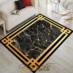 a living room area rug with black marble and gold trimmings on the floor