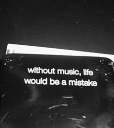 a black and white photo with the words without music, life would be a mistake