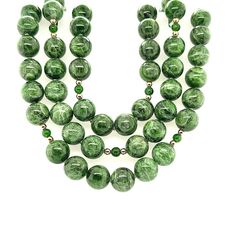 Every woman should have a strand of pearls, but not every woman (or man) has the opportunity to own a strand of rare, chrome diopside beads! This beautiful strand of 10 mm round, variegated chrome diopside beads displays gorgeous shades of basil, sage, and forest greens that makes us appreciate the beauty of nature and the outdoors. Accented with 18k yellow gold, vibrant emerald-green chrome diopside spacer beads, and finished with a high-polished 14k yellow gold clasp. A perfect accompaniment t Classic Green Jewelry With 8mm Beads, Formal Green Hand-strung Jewelry, Green Polished Beads Jewelry For Formal Occasion, Green High Luster Round Jewelry, Strand Of Pearls, Green Chrome, Spacer Beads, Gold Accents, Every Woman