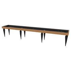 a long wooden bench with black legs and a shelf on the bottom that has two plants growing out of it