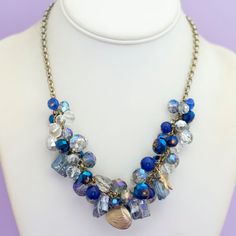 18 inch, Vintage Blue Beads Silver Tone Intricate Bib Necklace  GENERAL DESCRIPTION    Vintage Bib Necklace  Color: Silver Tone, Blue, Colorless Necklace Length: 18 Inches Last photo includes measurements of the necklace.   If you have any questions please feel free to message me! Blue Beaded Chain Spiritual Necklace, Blue Beaded Chain Necklace With Spiritual Style, Blue Spiritual Beaded Chain Necklace, Blue Beaded Charm Necklaces With Round Beads, Blue Spiritual Necklaces With Large Beads, Spiritual Blue Necklaces With Large Beads, Spiritual Blue Beaded Chain, Blue Beaded Chain Charm Necklace As Gift, Adjustable Blue Charm Necklace With Lobster Clasp