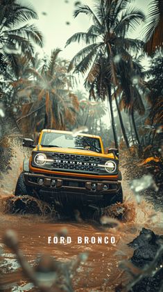 a yellow truck driving through mud in front of palm trees on a cloudy day with the caption ford bronco