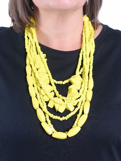 Our exclusive Lagenlook quirky wooden yellow strand necklace is a vibrant and eclectic accessory made of hand-painted wooden beads in various shapes, sizes, and colours. It features a long strand construction, adding a playful touch to any outfit. Lobster Claw closure with extension chain Wooden beads Length from neckline to bottom 11 inches (30 cm) approximately Yellow Multi-strand Beaded Necklace, Yellow Beach Necklaces With Wooden Beads, Yellow Necklaces With Wooden Beads For The Beach, Yellow Wooden Beaded Necklaces For Beach, Yellow Wooden Beads Necklace For Beach, Yellow Wooden Beads For Beach, Wood Bead Necklace, Necklace Long, Strand Necklace