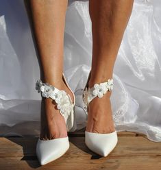 "💓I am here to create with you the handmade bridal heels shoes of your dreams and make your unique wedding day.💓 This beautiful comfort shoe boasts a sleek, minimalist silhouette with dazzling elements. Heel Height: 8cm /3.15\" or 5cm/1.96\" Full sizes only ** If you are unsure of your size, please contact me so I can assist you. ** If you need to have your product by a specific date, contact me and we can discuss express construction options. I would like to help! Check out our other wedding Lace Ankle Strap Heels For Ceremony, Ceremony Lace Ankle Strap Heels, White Lace Wedding Shoes With Ankle Strap, Lace Ankle Strap Wedding Shoes, White Lace Ankle Strap Wedding Shoes, White Lace Closed Toe Heels, Lace Wedding Heels With Block Heel, White Low Heel Lace Wedding Shoes, White Ankle Strap Wedding Shoes For Bridal Shower