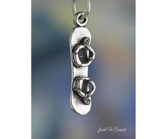 This sterling silver charm shows a snowboard with bindings for the popular winter sport of snowboarding.  The charm is three-dimensional and measures approximately 23mm tall, 5mm wide and 4mm deep.  This listing contains multiple photos and a detailed description (keep scrolling down for additional information!) If you have any other questions, please don't hesitate to ask.Material: solid .925 sterling silverSize (mm): 23mm tall, 5mm wide and 4mm deepSize (inches): just over 7/8" tall, about 3/1 Winter Sport, Large Hole Beads, Rochester Ny, Small Rings, Split Ring, Unique Necklaces, Winter Snow, Sterling Silver Charm, Snowboarding