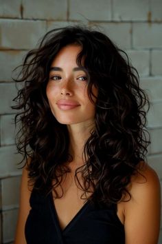 The Best Butterfly Haircut Ideas for Girls Curly Haircut Women Medium, Curly Wavy Medium Length Hair, Crown Layers Curly Hair, Long Bangs With Curly Hair, Loose Curl Haircut, Wavy Shag Haircut No Bangs, Curly Hair Choppy Layers, Cool Wavy Haircuts, Thick Wavy Medium Length Hair