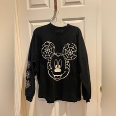 Used In Excellent Condition. No Rips Or Stains. Some Light Cracking On Design On Arm (Spider Webs) But Nothing Too Crazy. All Designs Glow In The Dark ( Front, Arm, And Back). Unisex Size M. Very Rare Hard To Find. Disneyland Mickey Mouse, Dark Spirit, Spider Webs, Disney Sweaters, Spirit Jersey, Very Rare, In The Dark, Glow In The Dark, Disneyland