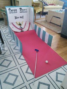 a miniature golf course set up on the floor