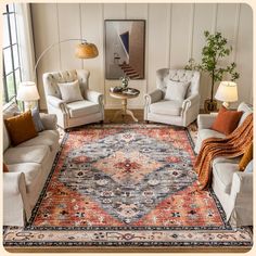 a living room filled with furniture and a rug