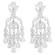 Platinum Chandelier Diamond Earrings, with top diamond cluster and five drops. Features 27.00 Carats of Diamonds. G-H in Color VS in Clarity. Antique Diamond, Modern Earrings, Diamond Cluster, Modern Chandelier, Diamond Gemstone, Modern Jewelry, Chandelier Earrings, Clip On Earrings, Diamond Jewelry