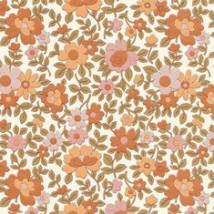 an orange and pink flower pattern on white fabric