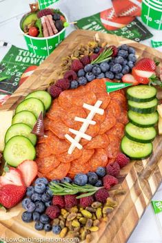 a football themed platter with fruit and vegetables