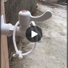 an image of a video showing how to use a water hose attached to a wall