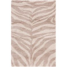 a beige rug with zebra print on it and a white floor mat in the middle