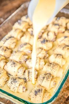 someone pouring batter into a casserole dish