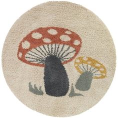 a mushroom rug with two mushrooms on it