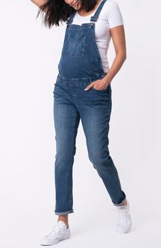 Sweeten your casual-cool vibe in these stretchy denim overalls designed in a perfect bump-cradling silhouette. Adjustable buckle straps; side button closures Four-pocket style 99% cotton, 1% elastane Machine wash, line dry Imported Denim Blue Overalls With Adjustable Straps, Denim Blue Jumpsuit With Adjustable Straps, Medium Wash Denim Overalls With Adjustable Straps, Medium Wash Shortalls With Adjustable Straps, Medium Wash Denim Jumpsuit With Adjustable Straps, Utility Denim Bottoms With Bib Front, Utility Denim Bib Front Bottoms, Casual Denim Jeans With Adjustable Straps, Dark Wash Denim Jumpsuit With Adjustable Straps