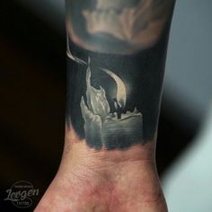 a person's arm with a tattoo on it