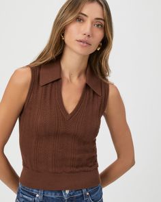 In a luxurious Eco Peachskin fabrication, this retro brown sweater tank is designed with a collared v-neckline and herringbone pointelle stitch detailing throughout. Part of our Eco-Evolution collection, the Rossana Sweater Tank was made from recycled materials to reduce our environmental impact and minimize waste. The goal of our sustainable efforts is to constantly evolve for the better. We are working hard to source environmentally responsible materials that don�’t compromise our exceptional q Ivory Sweater, Men Store, Outerwear Vest, Denim Shoes, Sweater Tank Top, Sweater Tank, Working Hard, Brown Sweater, Environmental Impact