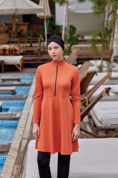 We designed our swimsuit with a simple model, offering a modest appearance, complemented by a cinnamon color that suits the summer. Our model, featuring a lycra structure, provides freedom of movement and is a full coverage burkini. Order yours now and enjoy your vacation smelling like cinnamon! The post Plain Style Cinnamon Burkini appeared first on Burkini Remsa. Cinnamon Color, Enjoy Your Vacation, Plain Style, Freedom Of Movement, Modest Dresses, Modest Outfits, Orange Color, Color Options, Cinnamon