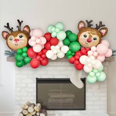 a fireplace decorated with balloons and reindeer heads