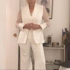 New ! Lost Tags But Never Worn , I Just Worn It For Photos ! Elegant ,Chic Jacket, Blazer In Silk Organza In Size L Has 3 Front Buttons And A Lining ! Bought It In Europe For 150 $. Lady Is 5.10’ Tall, Bust 36d, Waist 30’’! Chic White Party Blazer, Chic Cream Blazer For Wedding, Feminine White Outerwear For Work, Chic Cream Wedding Blazer, Elegant Fitted Winter White Blazer, Elegant Off-white Workwear Blazer, Elegant Off-white Blazer For Work, Elegant Off White Blazer For Work, Elegant White Spring Blazer