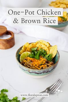 A ceramic bowl with a chicken and rice meal is topped with tortilla chips, cilantro, cheddar cheese, and a lime wedge. Protein Veggies, Fiber One, One Pot Dishes, Savory Recipes, Food Words