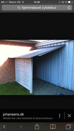 an image of a garage with the door open