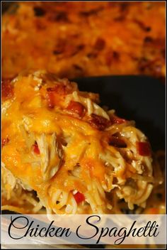 chicken spaghetti casserole on a black plate