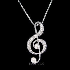 "Want a personalized gift? -Add a Swarovski Crystal Birthstone charm here: https://www.etsy.com/listing/577441131 -Add an Alphabet Initial Letter here: https://www.etsy.com/listing/208545689 PERFECT GIFT FOR MUSIC FANS, INSTRUCTOR, TEACHER OR STUDENT!! Great Gift for Bride who are musician. This sparkling Crystals TREBLE CLEF music melody pendant with Swarovski crystals measuring 5/8\" wide X 1 3/8\" high (17mm X 33mm). It comes with a FREE 15.5\" inch (39cm) Original Rhodium Plated Cable Chain Musical Note Jewelry, Bff Christmas, Music Necklace, 60 Birthday, 50 Birthday, Friends Bridal, Wedding Charm, Friend Bff, Music Jewelry