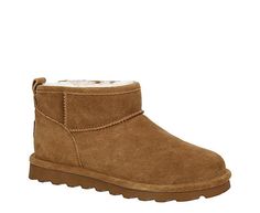 Bearpaw Shorty Women’s Fur Boot  Get warmth up to your ankles in the Shorty women's fur Boot by Bearpaw. With a suede upper featuring BearCoat™ Rain and Stain Repellent to protect against the elements, this pull-on Boot ie is perfect for cold days out and about. The lining & footbed offer warm cushioning while the outsole adds some traction to your unbothered steps.  Suede upper  Pull-on  Wool blend lining  Sheepskin footbed  Treated with BearCoat™ Rain and Stain Bear Claw Boots, Fur Boots Women, Bear Claws, Rack Room, Rack Room Shoes, Pull On Boots, Fur Boots, Days Out, Cold Day