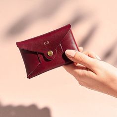 A beautiful burgundy leather change purse for cards and coins, personalised with your initials. The perfect shade for autumn. Our personalised leather card and coin purses are the perfect size for when you don't need your full sized wallet: nights out, holidays, travelling light. With a name or initials on the front and a secret message printed inside, they make a gorgeous gift for her, whether it's for Mum on Mother's Day, your best friend's birthday or a treat for yourself. Handmade from susta Affordable Red Coin Purse As A Gift, Luxury Leather Coin Purse As Gift, Luxury Leather Coin Purse For Formal Occasion, Best Friend's Birthday, Office Secret Santa, Leather Change Purse, Card Purse, Maroon Leather, Origami Design