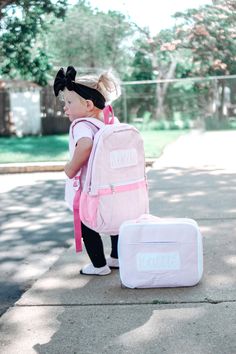 Our seersucker kids backpacks are not only adorable, but well made! They are lightweight and lined - perfect for kids! They feature a large exterior pocket on front as well as two exterior pockets. There is an additional large pocket inside for extra organization. Size: 16 x 13 x 3.5 Blue comes with faux leather name tag and name embroidered in white Pink comes with white seersucker name tag and name embroidered in pink If you prefer another style for the name or name tag, please send me a messa Preppy Pink Backpack For School, Pink Preppy Backpack For School, Back To School Gingham Backpack For Everyday Use, Gingham Backpack For Everyday Use And Back To School, Back To School Gingham Bags, Preppy White Rectangular Backpack, Gingham Backpack For Travel And School, Back To School Gingham Travel Backpack, White Backpack For Daycare