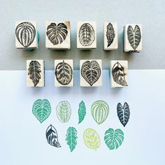 several rubber stamps with leaves on them