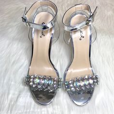 Gem Cluster Clear/Metallic Silver Ankle Strap Heels Dazzling Sparkly Iridescent Chunky Crystal Gems Sexy Metallic Vegan Leather & Clear Straps Non Slip Bottom Soles Rare Style! Last Pair New Size 7 True To Size 5” Don’t Have A Poshmark Account Yet? Use Code: Crimsoncobbler At Sign Up To Receive $10! Bebe, 2b, Zara, Express, Revolve, Tigermist, Topshop, Ohpolly, Missguided, Hotmiamistyles, Nakedwardrobe, Fashionnova, Asos, Prettylittlething, Windsor, Boohoo, Wowcouture, Guess, Marciano, Bcbg, Max Iridescent High Heel Party Heels, Iridescent Synthetic Heels, Iridescent Heels For Summer Party, Iridescent Heels For Formal Summer Events, Summer Formal Iridescent Heels, Iridescent Open Toe Heels For Party, Iridescent Round Toe Heels For Party, Clear Round Toe Heels For Night Out, Glamorous Iridescent Heels For Evening