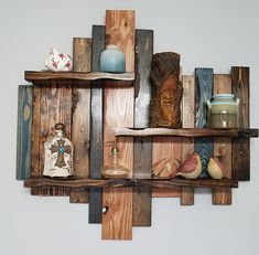 several wooden shelves with vases and other items on them