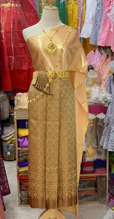 "This is Asian traditional dress is made from synthetic silk for top and skirt (adjust size by hook), length 36 inches. This dress set including with one sabai and one sarong . It is very unique and easy to wear. This item we have 2 type size. 1. Standard size Waist 23-30\" Hip max. 37 \" 2 Plus size Waist \" up to 42\" Hip up to 46\" Item not include blouse, jewelry, or accessory Note: - Each item may have very slight variances and imperfections due to the handmade process - The actual color ma Lao Clothing, Traditional Thai Dress, Laos Clothing, Plus Size Satin, Wedding Outfits For Groom, Thai Wedding Dress, Temple Dress, Thai Wedding, Traditional Dresses Designs