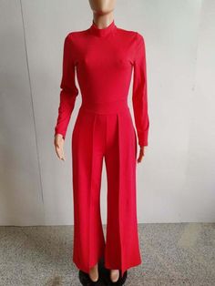 Tailored Long Sleeve Pantsuit For Party, Elegant Stretch Suits, Elegant Long Sleeve Stretch Suits, Elegant Stretch Suits For Office, Solid Fitted Suits For Fall, Fitted Solid Suits For Fall, Elegant Evening Jumpsuits And Rompers For Fall, Elegant Jumpsuits And Rompers For Evening In Fall, Stretch Pantsuit For Formal Occasions In Fall