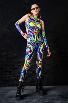 Slay this year's festival season with this amazing psychedelic rave outfit. This sexy rave bodysuit fits like a glove and holds everything in place. It’s form-fitting construction is flattering and sucks you in. It's the perfect festival bodysuit for all the rave queens out there! The back zipper closure is extra robust and invisible allowing for flawless graphics all over. The psychedelic print is crisp with vibrant and saturated colors true to the photos. Features: hidden back zip closure, moc Festival Bodysuits, Aerial Costume, Rave Bodysuit, Cyberpunk Clothes, Rave Clothing, Rave Outfit, Clothes Women, Mock Neckline, Saturated Color