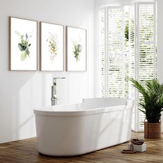 a bath tub sitting on top of a wooden floor