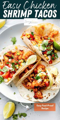 easy chicken shrimp tacos on a plate with limes