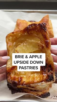 a person holding up a piece of food with the words brie and apple upside down pastries