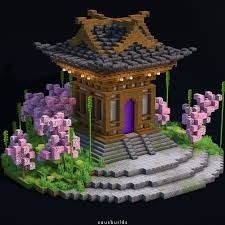 an image of a building with flowers around it