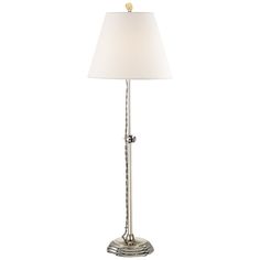 a lamp with a white shade on it