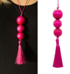 Brighten up your day with a handmade long beaded wooden BOHO necklace. It's chunky and funky so it's a real statement piece. This is a combination of three wooden beads in three sizes (30mm (1.15"), 25mm (1"), 20mm (0.77")) tone on tone with the cord and tassel. The cord is waxed polyester. It is flexible yet durable. The tassel gives the BOHO necklace a lightness of summer. The sliding knot allows you to adjust the length in the shortest. The maximum length is 70 cm or 27 inches. Trendy Pink Beaded Necklaces With Large Beads, Trendy Pink Beaded Necklace With Large Beads, Pink Long Necklace For Gift, Pink Wooden Beaded Necklaces For Gifts, Pink Wooden Beads Necklace For Gift, Pink Large Beaded Long Necklace, Pink Long Necklace With Large Beads, Long Pink Necklace With Large Beads, Chunky Bead Necklace