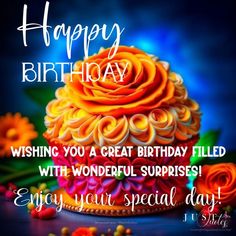 a cupcake with orange frosting and flowers on it is happy birthday card for someone