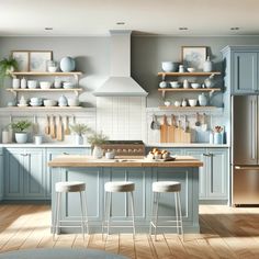 a kitchen with blue cabinets and wooden floors