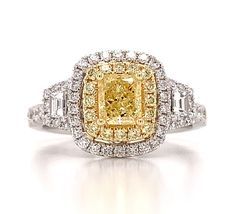 a fancy yellow and white diamond ring